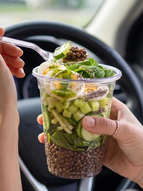 A fresh Salad Cup being eaten on the go